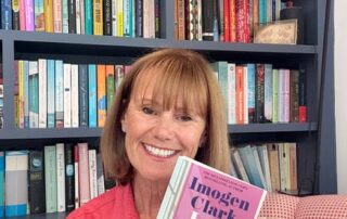 Photo of Imogen Clark with her book Late in the Day - Out Now